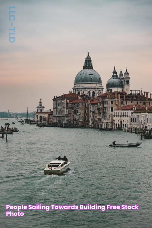 People Sailing towards Building · Free Stock Photo